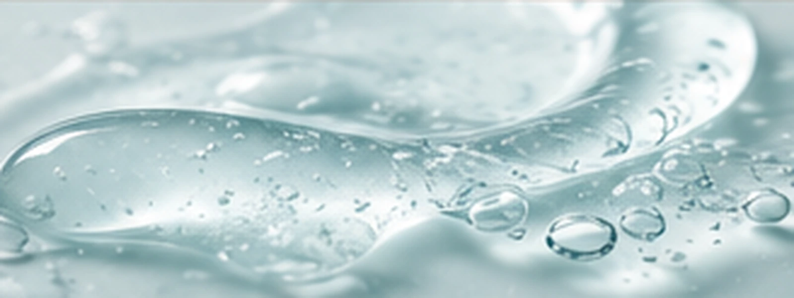 Cool aqua-clear gel pool with rounded droplets on a bright ivory-compatible background.